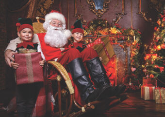Santa,Claus,And,The,Elves,Children,With,Gift,Boxes.,Miracles